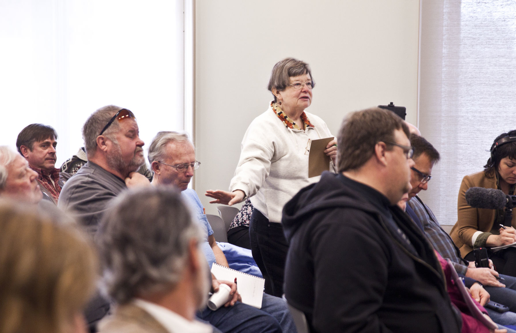 Eileen Greb, a registered nurse, asks a question Wednesday regarding the EPA's healthcare studies